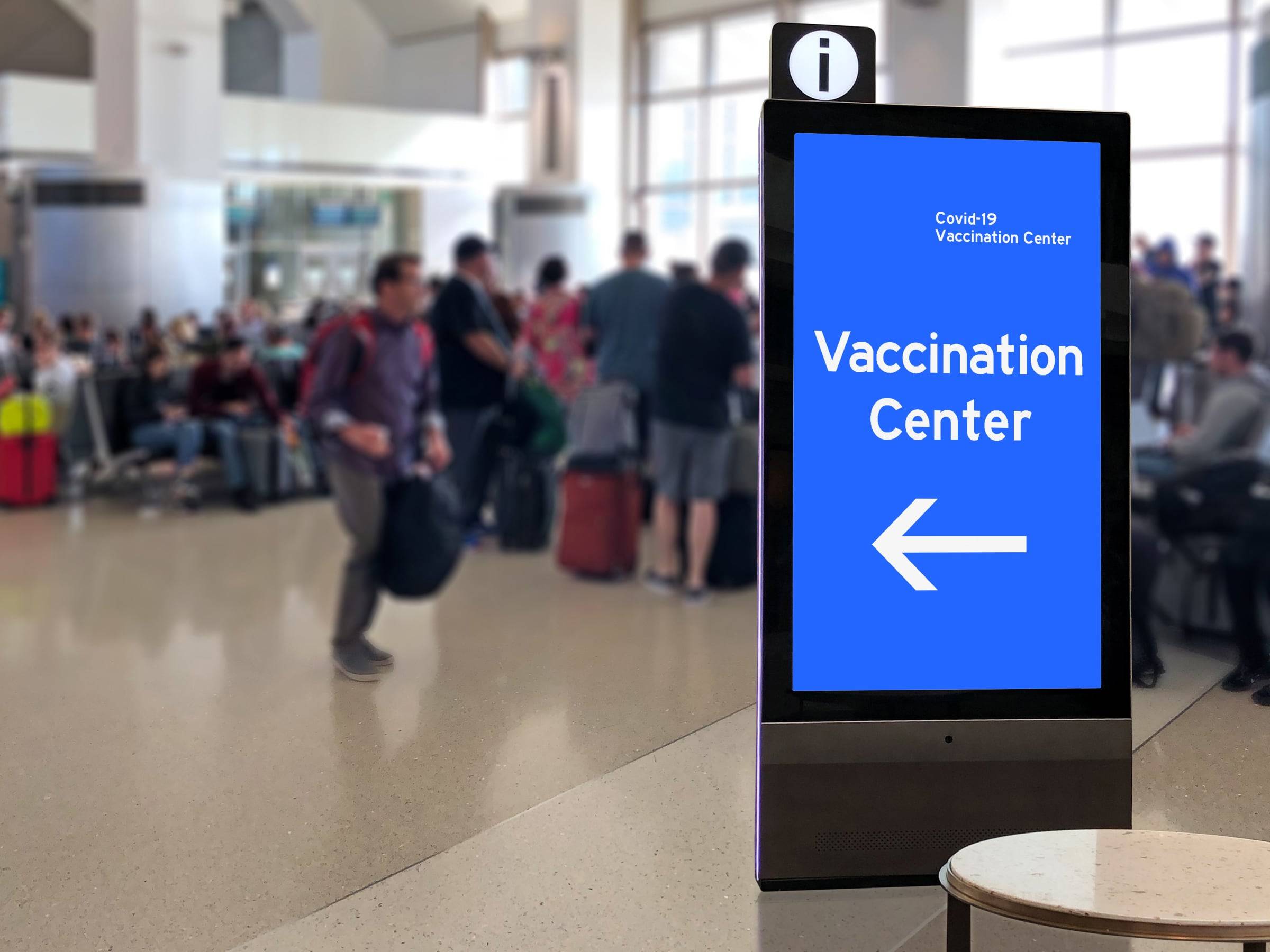 digital kiosk signage at a vaccination center.