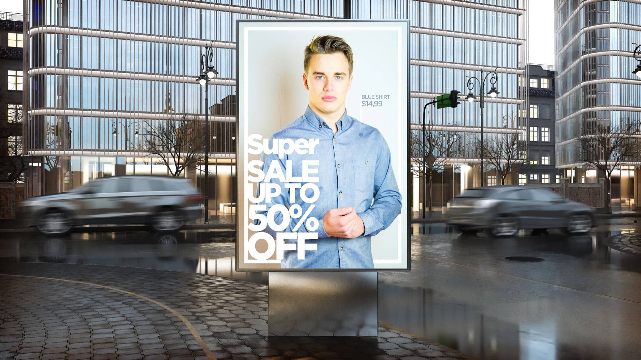 Digital billboard displaying a shirt advertisement beside a road with passing cars.