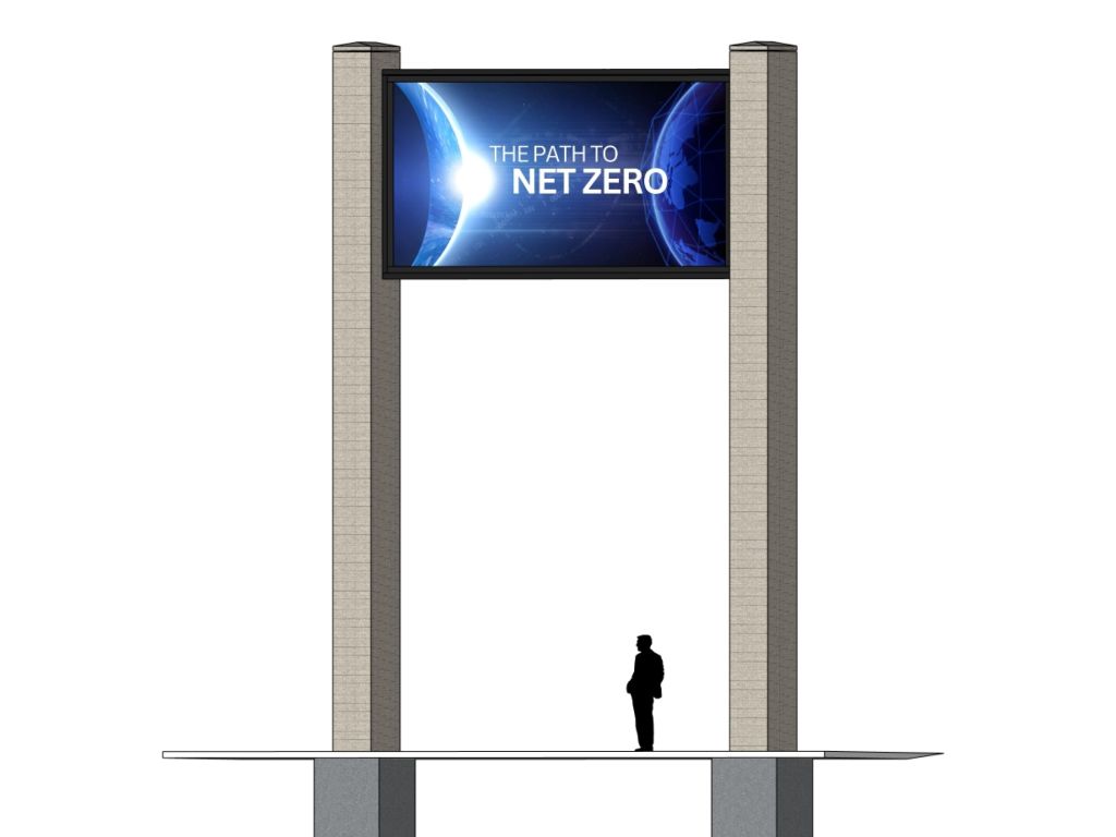 Digital Signage Permitting A woman working on a digital display screen.